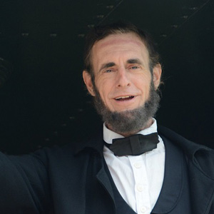 Abraham Lincoln portrayed by Kevin Wood