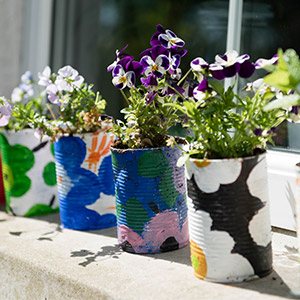 Painted tin can flower pots