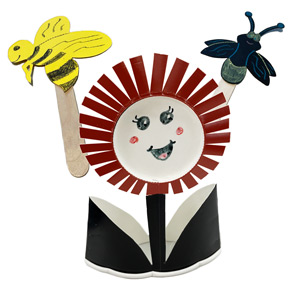 A smiling flower made from paper plates and paper insects on popsicle sticks