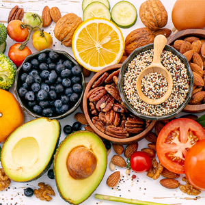 A variety of foods, including nuts, whole grains, and fruit