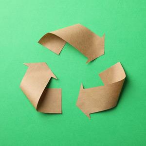 Recycling symbol made of paper