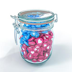 A mason jar filled with red and blue tokens