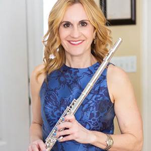 Kathrine Eldridge holding a flute